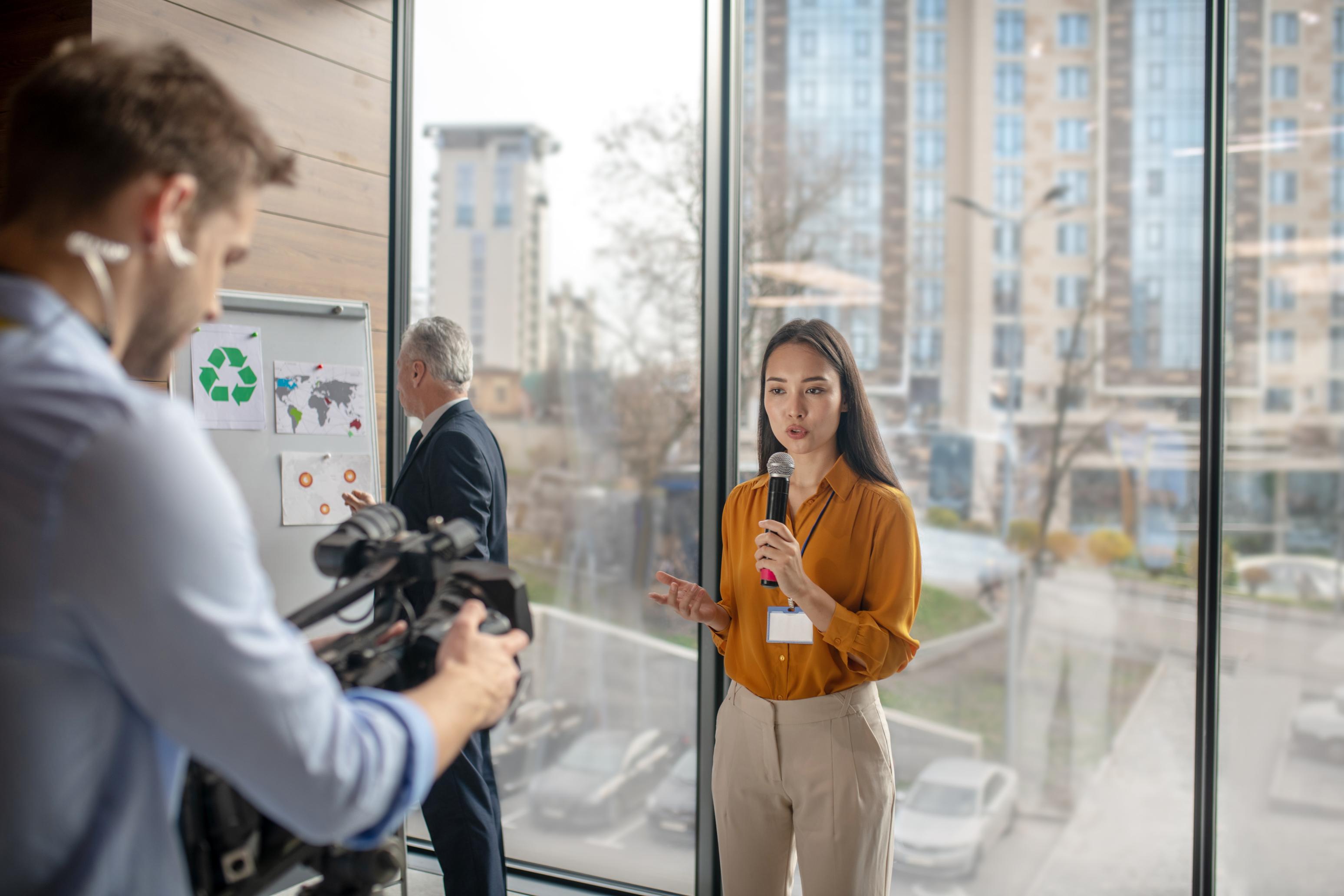 dark-haired-female-reporter-talking-to-the-videoca-2023-11-27-05-27-28-utc (1).jpg