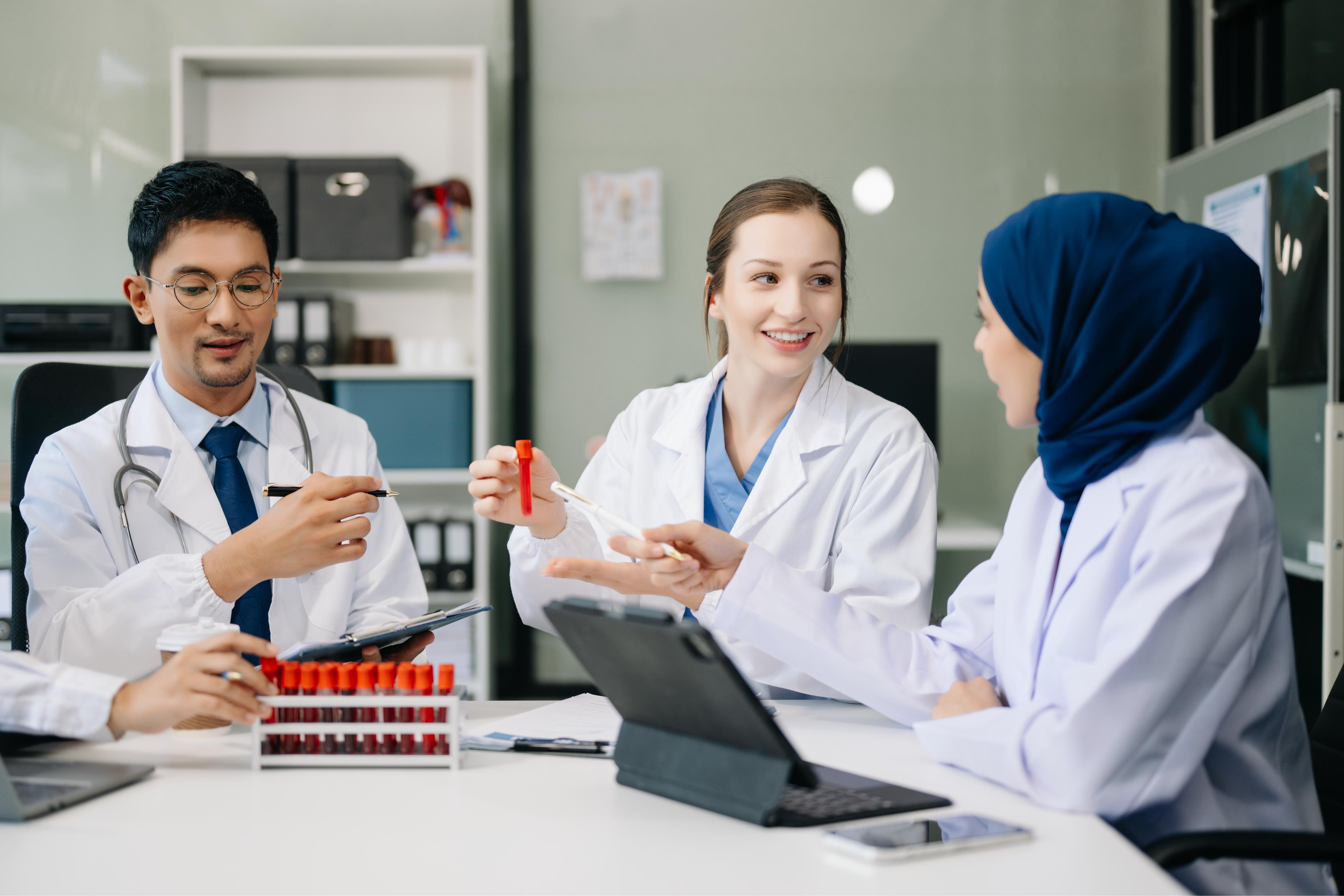 medical-meeting-and-laptop-for-team-in-discussion-2024-03-12-21-27-27-utc (1).jpg