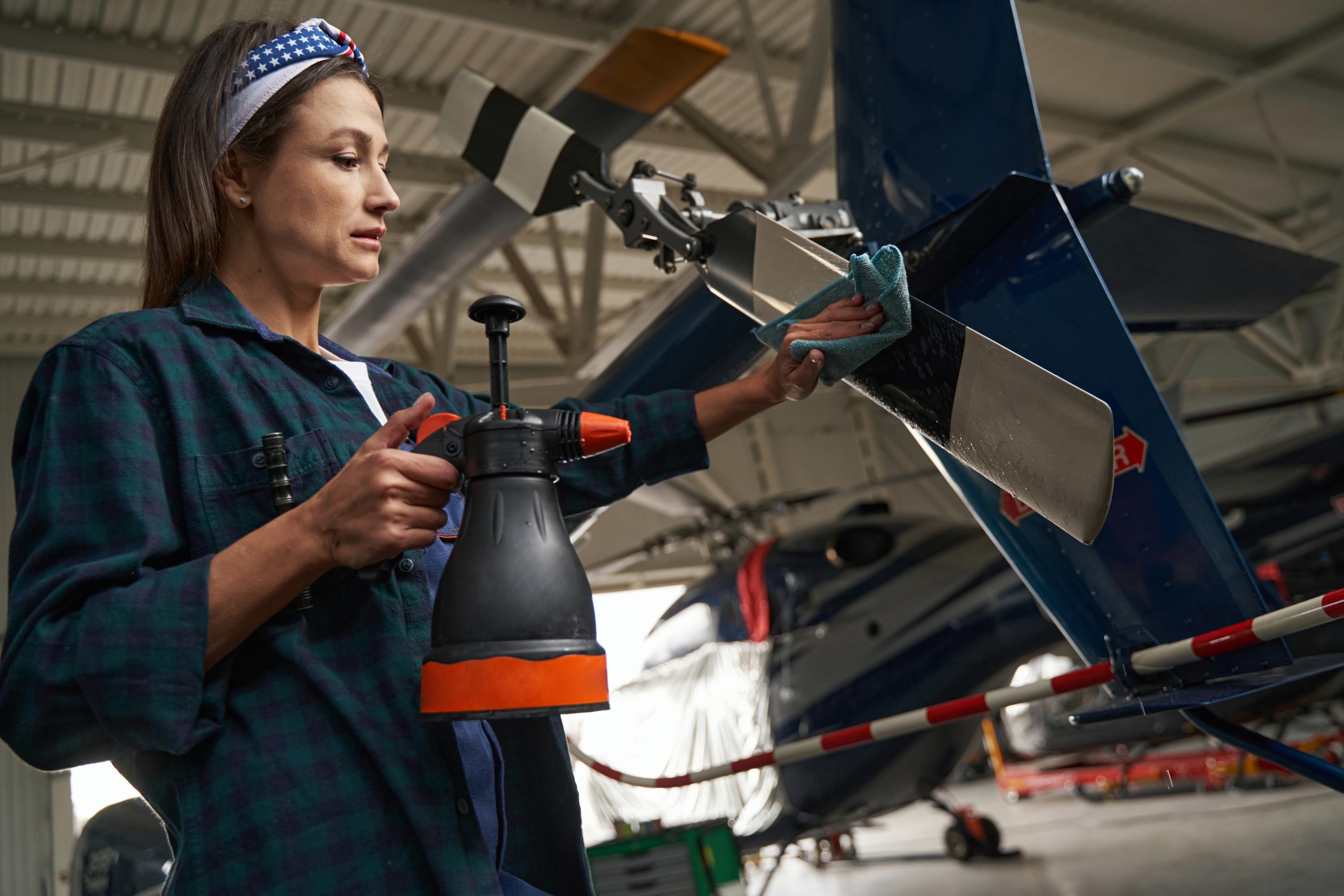 caucasian-woman-in-uniform-with-hand-pumped-spraye-2023-11-27-04-57-33-utc (1).jpg