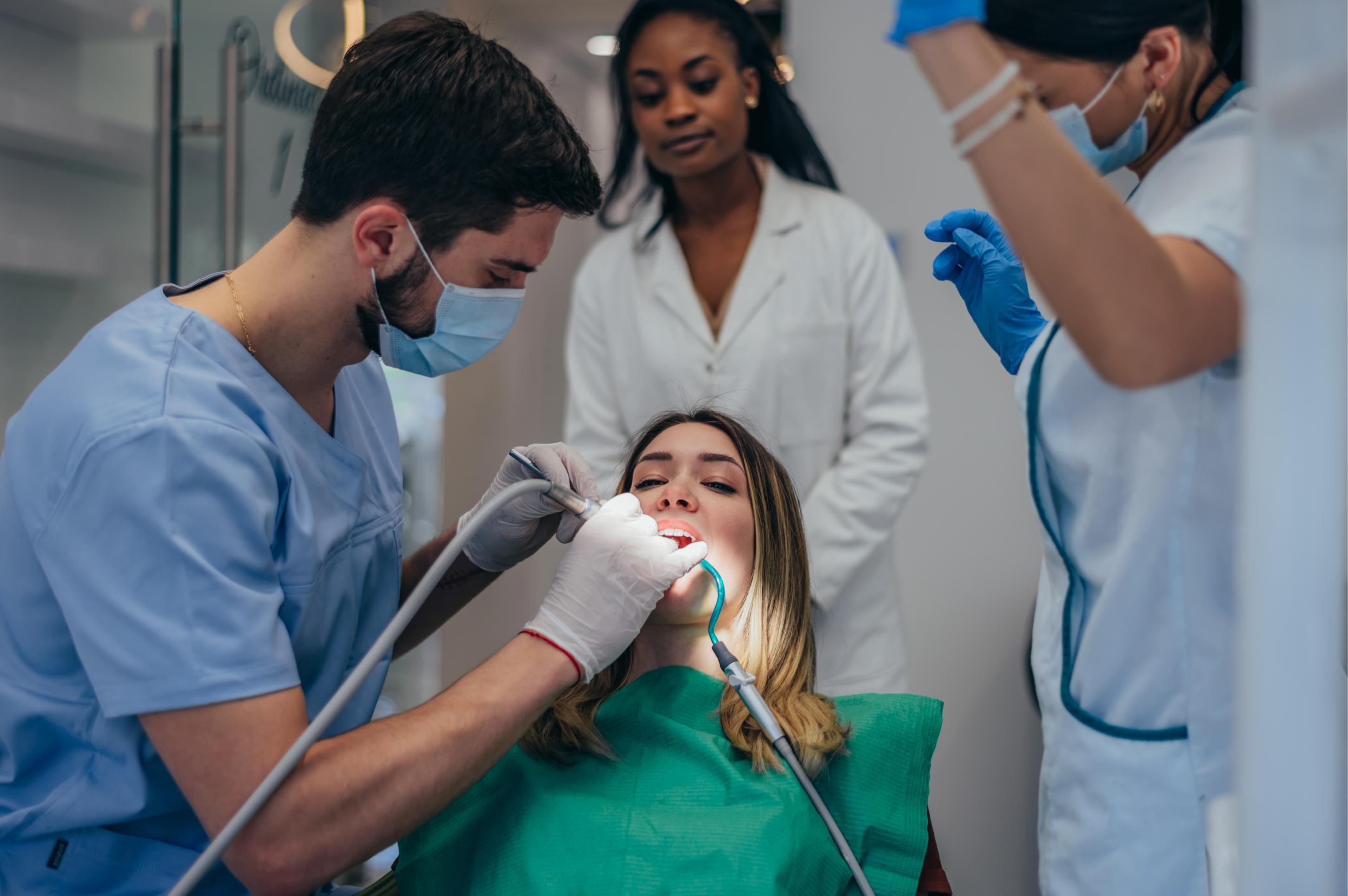 woman-patient-in-dental-clinic-being-examined-by-a-2023-11-27-04-53-25-utc (1).jpg