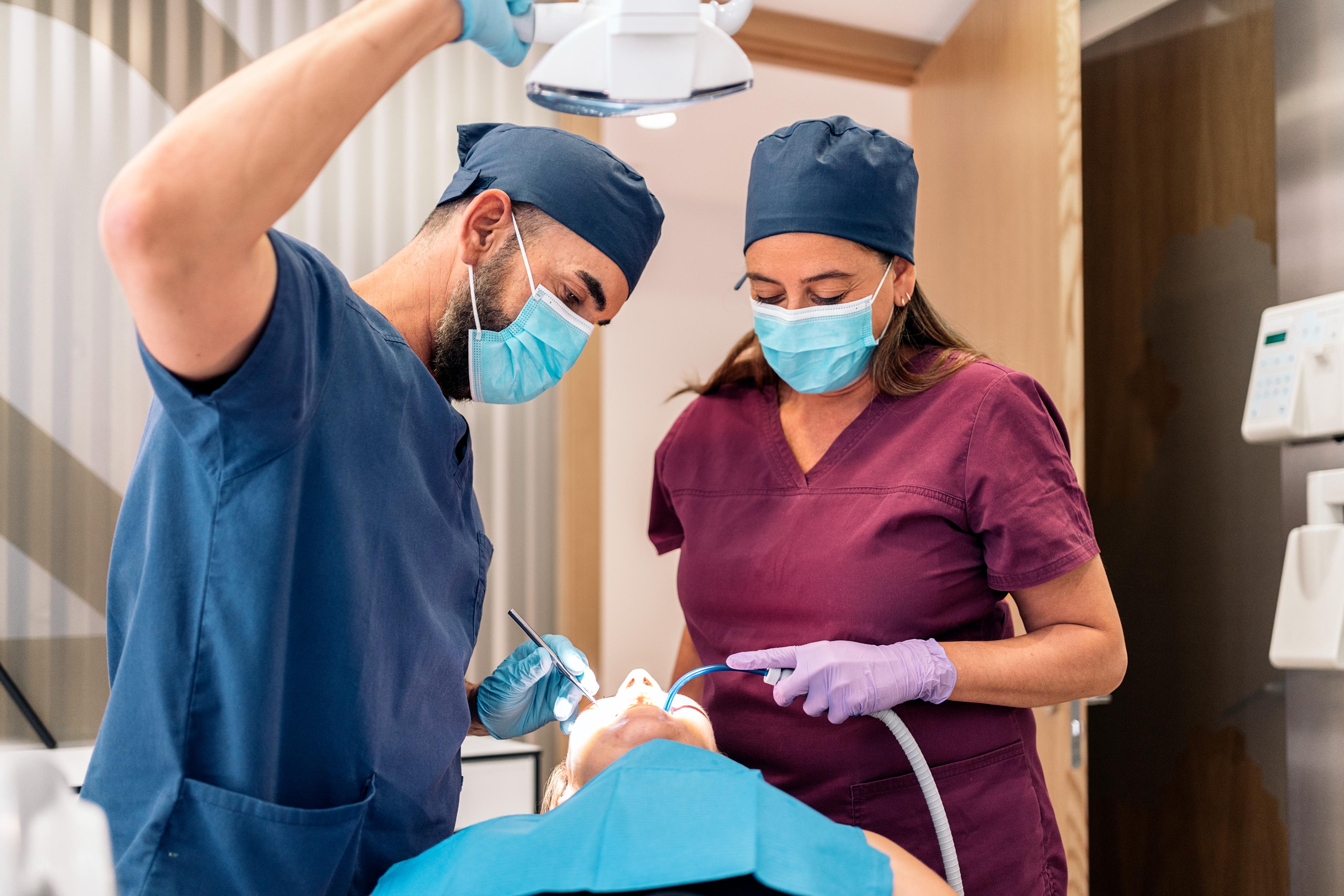 dental-clinic-workers-with-a-patient-2023-11-27-05-10-40-utc (1).jpg