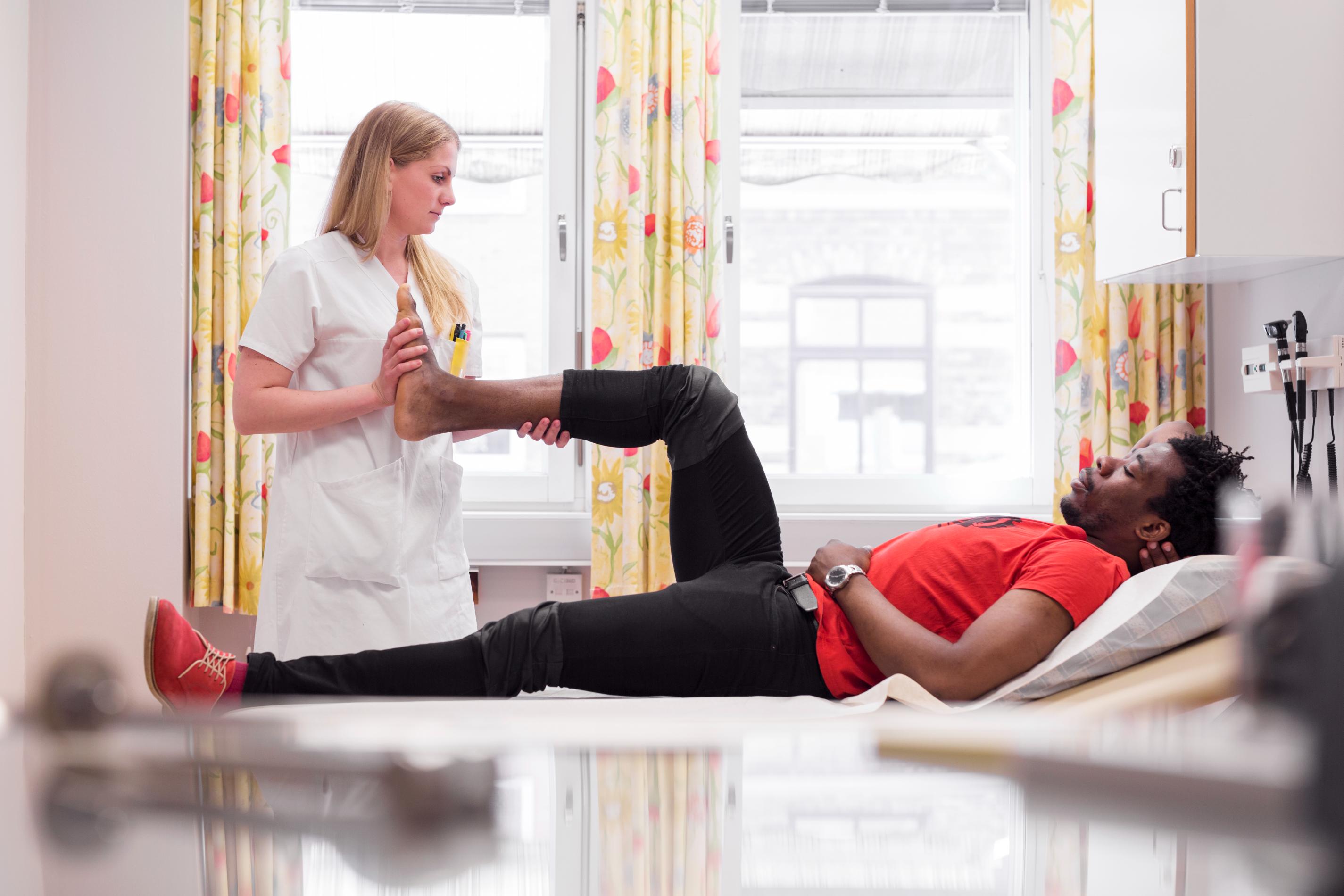 young-man-with-doctor-during-medical-procedure-2023-11-27-05-22-40-utc (1).jpg