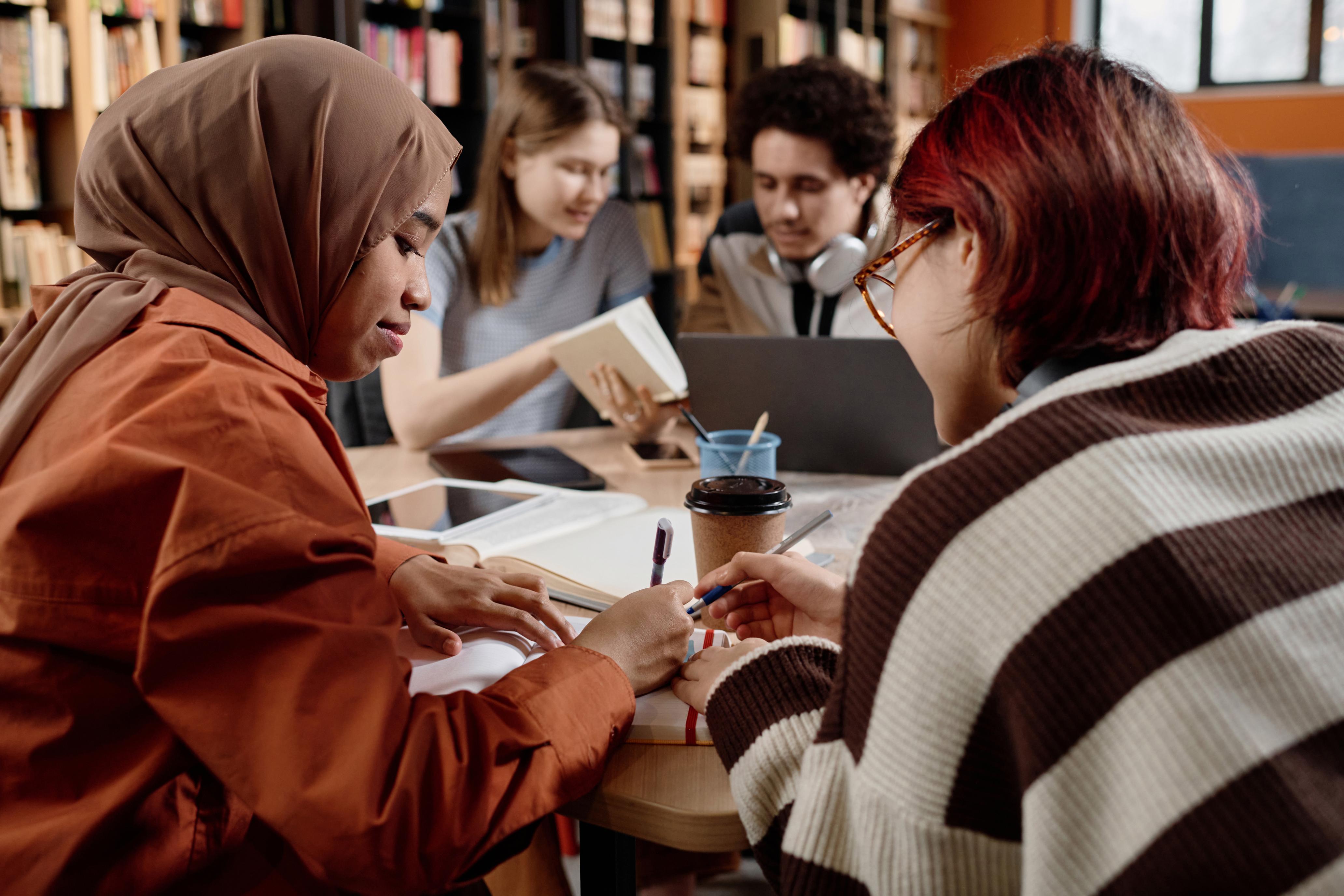two-girls-studying-in-library-2024-05-22-16-31-09-utc (1).jpg