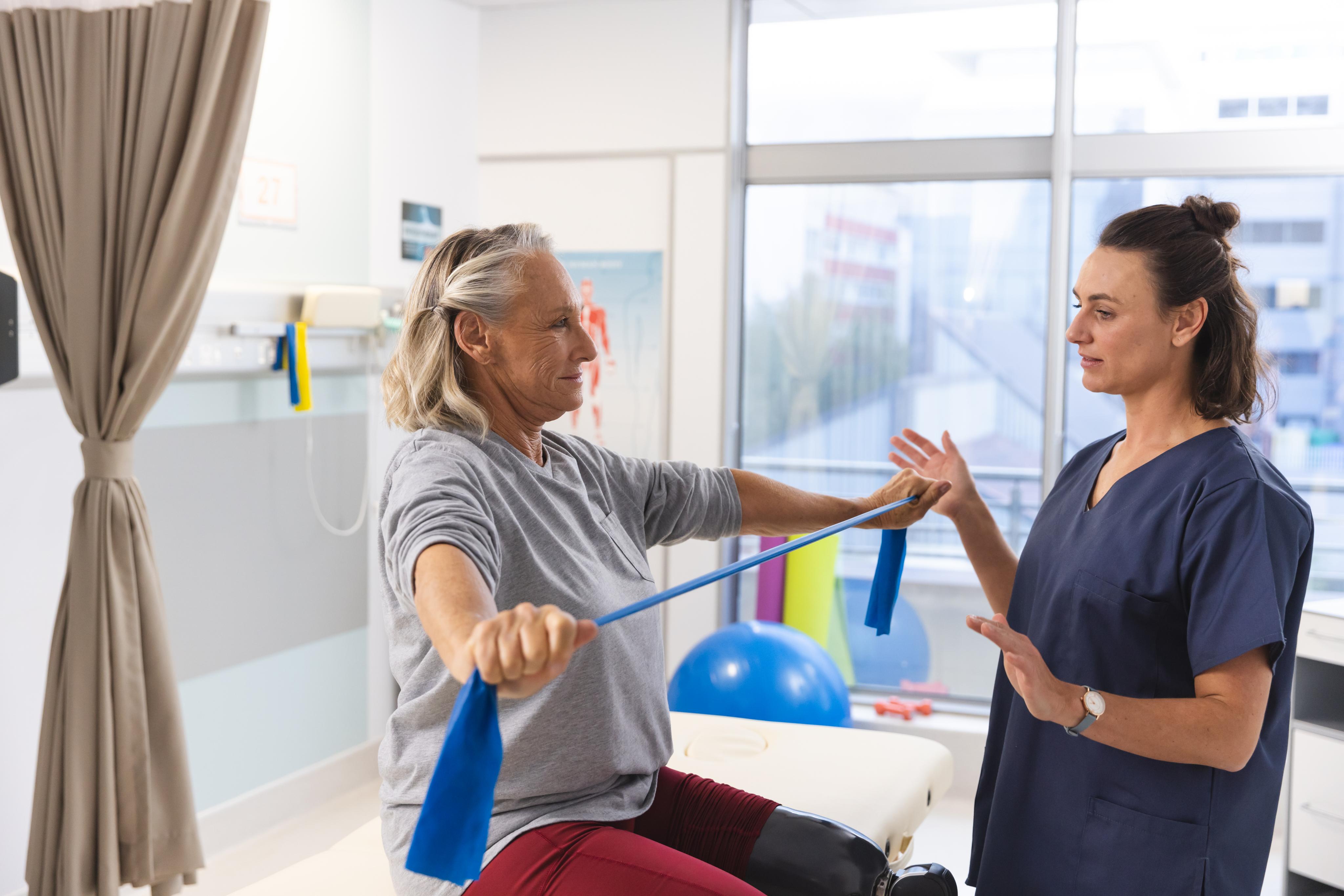 caucasian-female-physiotherapist-and-senior-woman-2023-11-27-05-10-24-utc (1).jpg