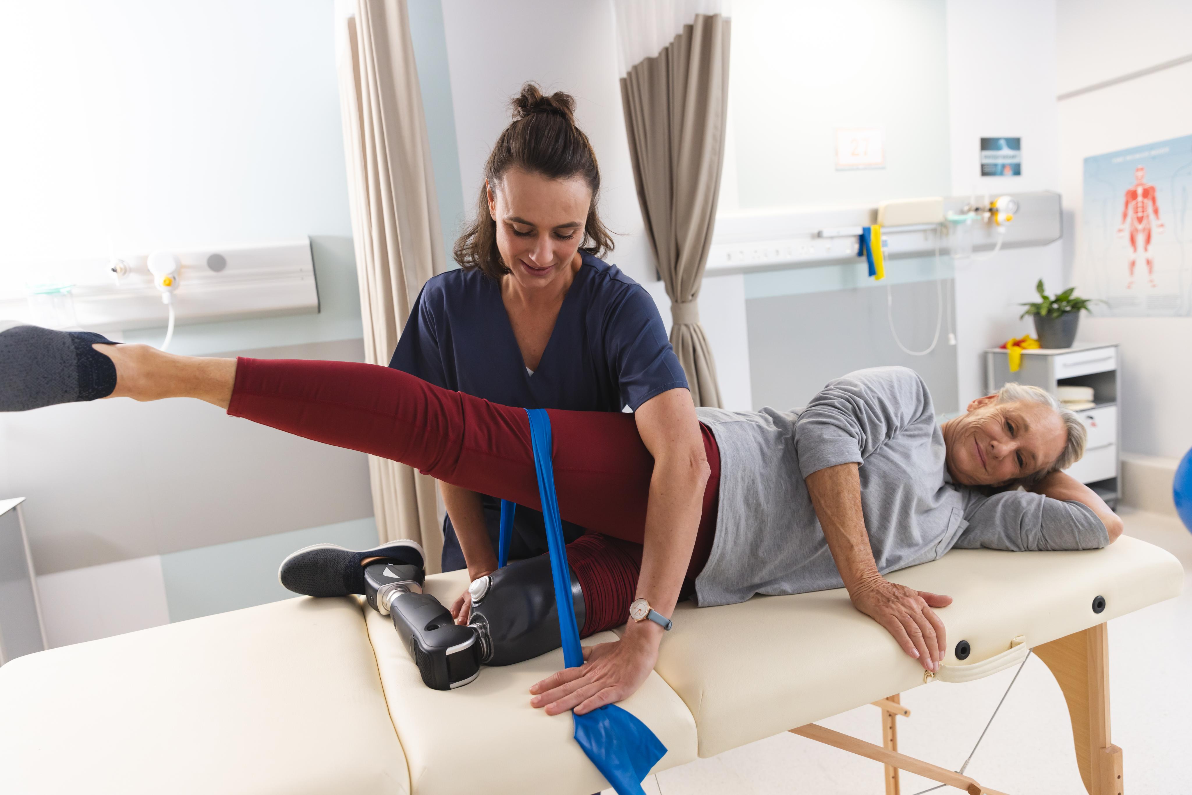 caucasian-female-physiotherapist-and-senior-woman-2023-11-27-05-07-52-utc (1).jpg